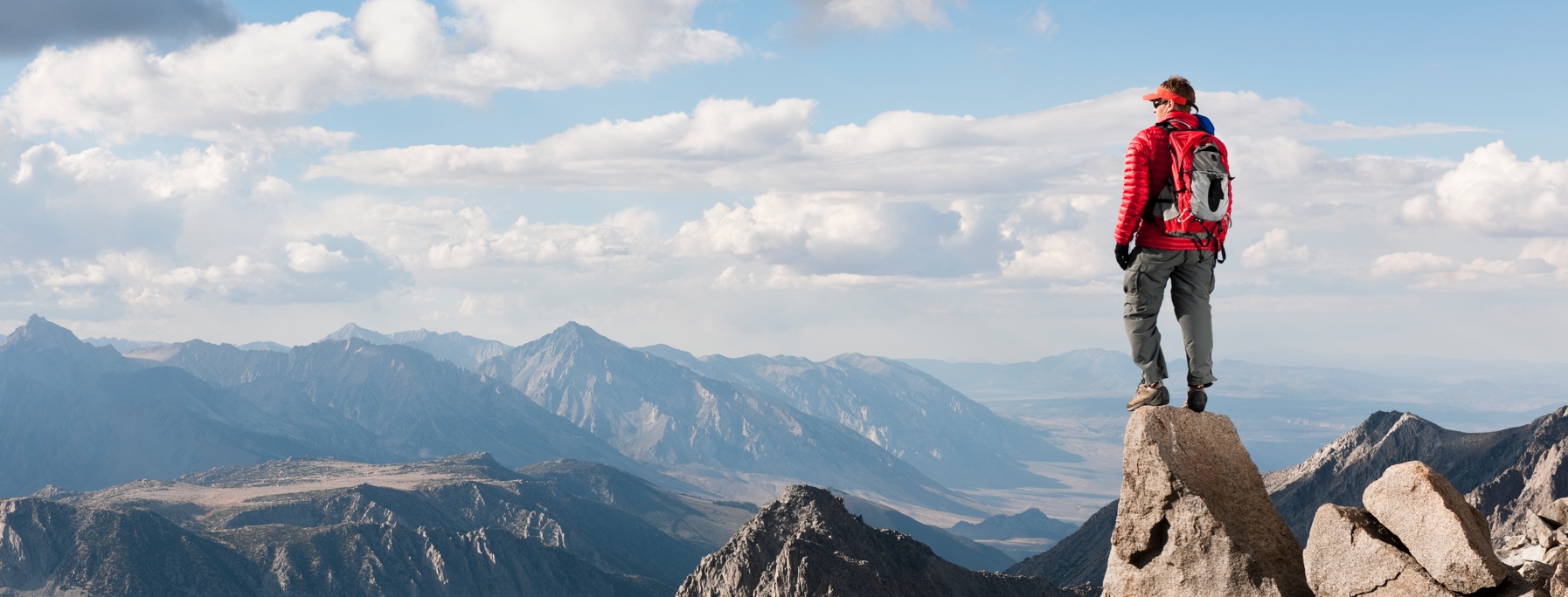 Man succeeding in reaching the top